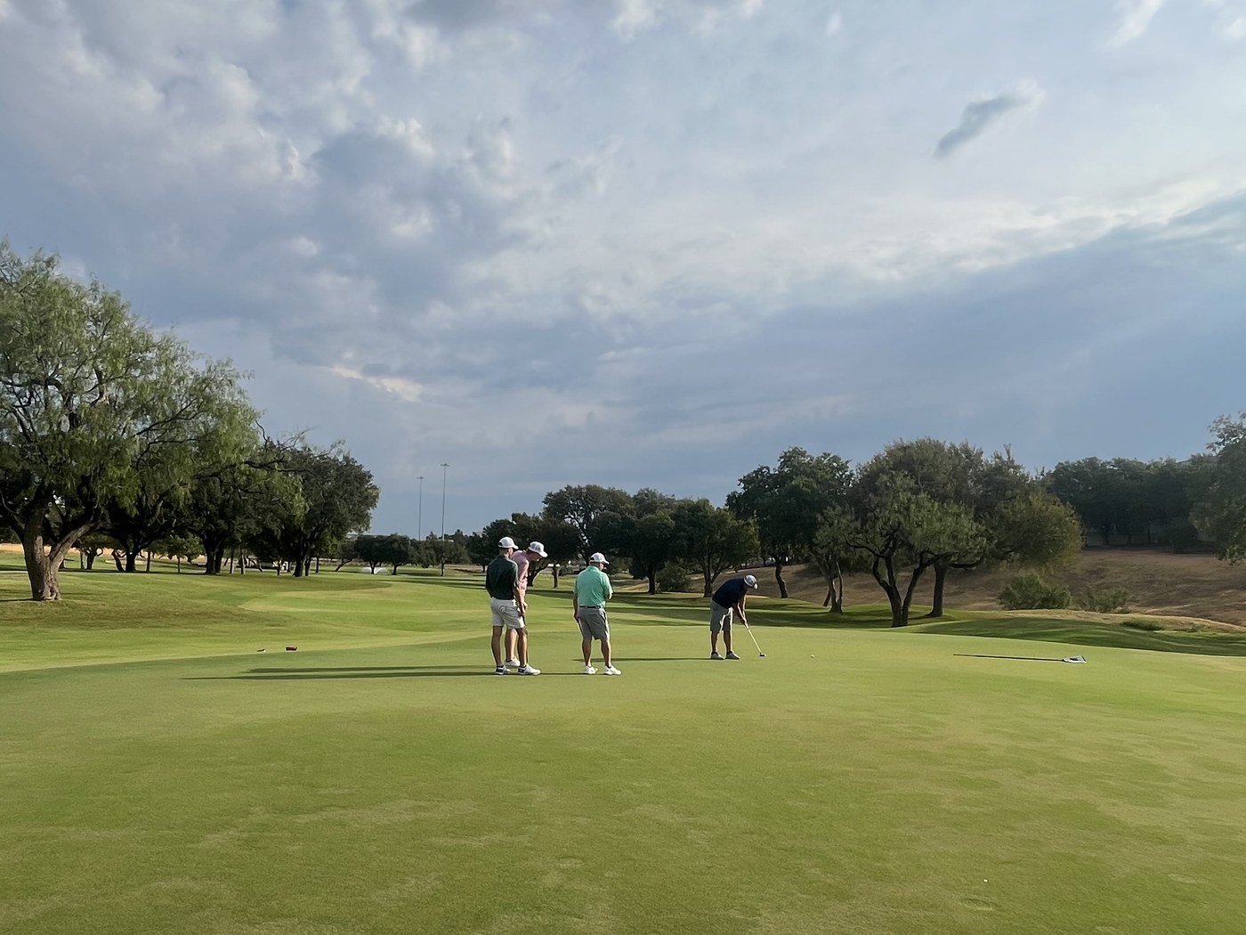 Golfers on the green at the VOA Texas DFW tournament